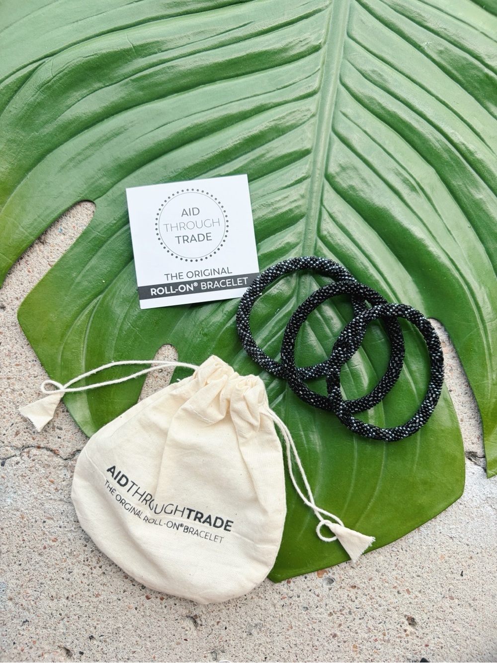Set of 3 Black and Dark Blue Aid Through Trade Roll On Bracelets